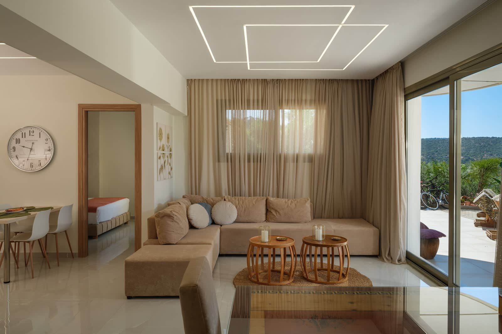 Living room seating by the sliding doors to the terrace