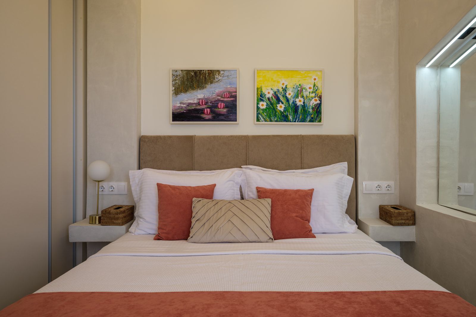 Bright bedroom with white linen and terracotta accents — the garden bedroom